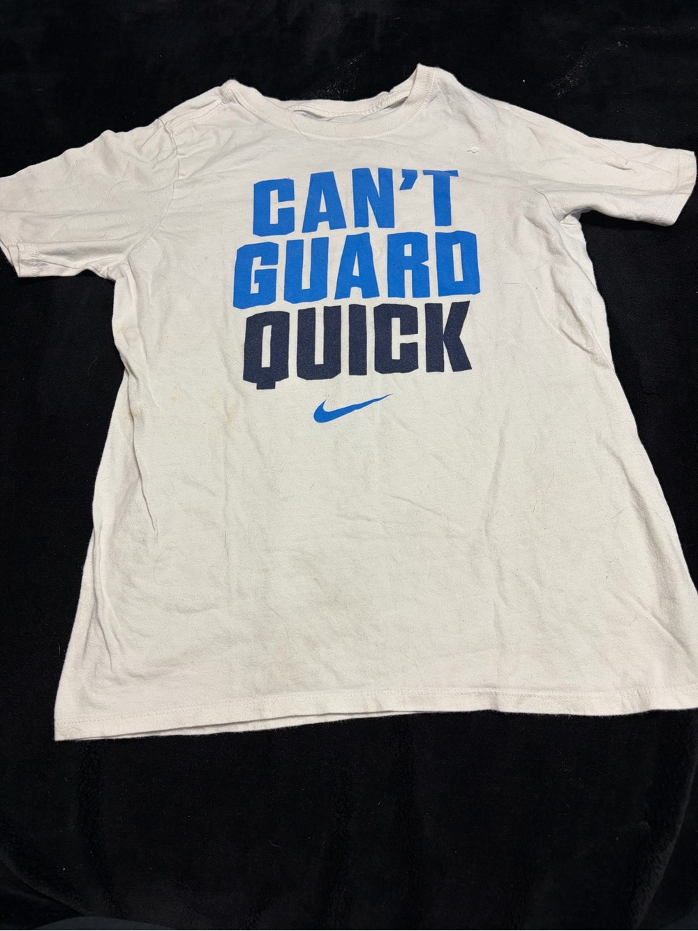 Nike White Tee with Subtle Blue Swoosh and Text